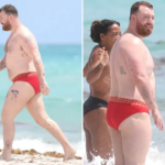 Sam Smith porte un maillot de bain rouge à Miami Beach et s'acoquine avec un homme mystérieux