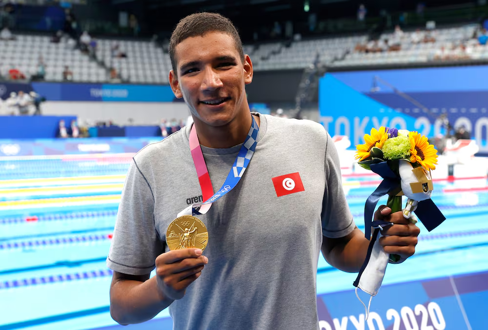 Le Tunisien Ahmed Hafnaoui, médaillé d'or olympique, en grand danger pour Paris 2024